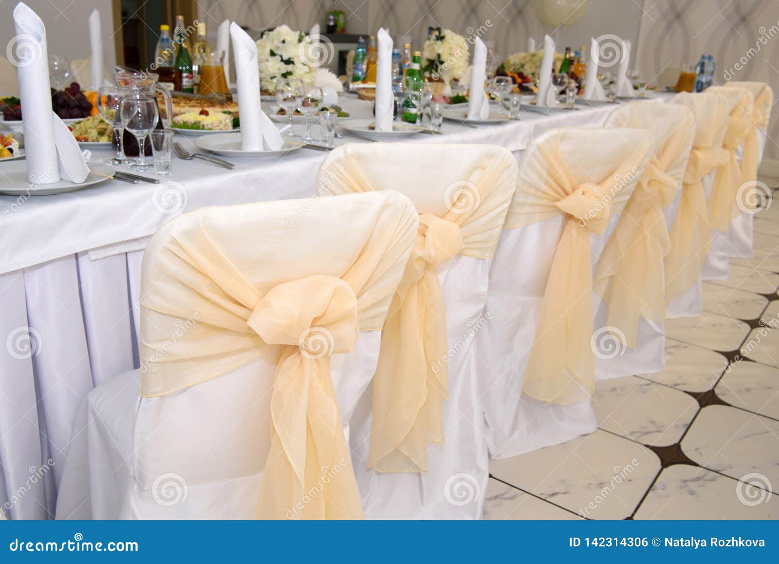 Wedding Bows On The Chairs Of The Banquet Hall Stock Photo Image