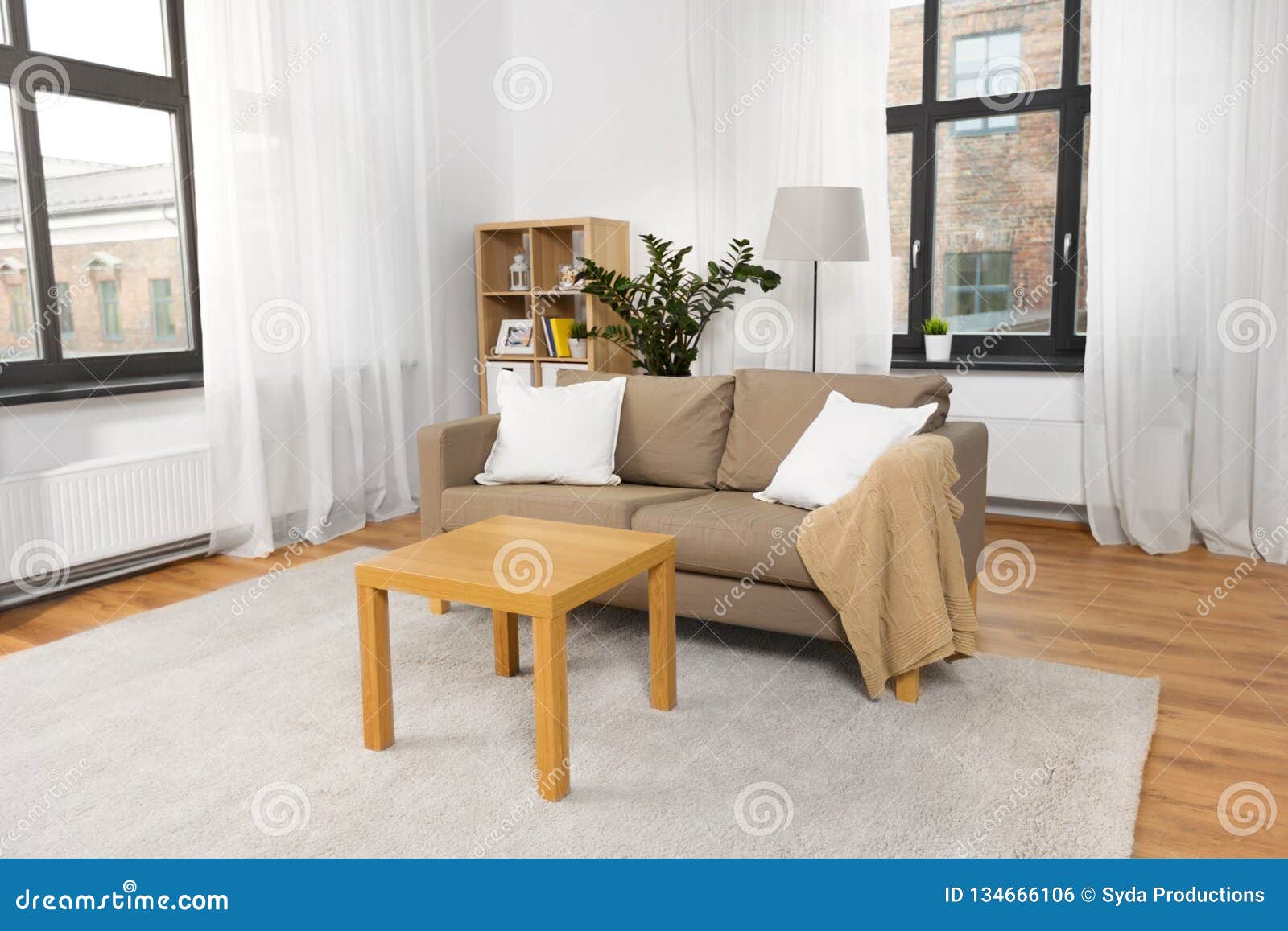 Interior Of Home Living Room With Sofa And Table Stock Photo