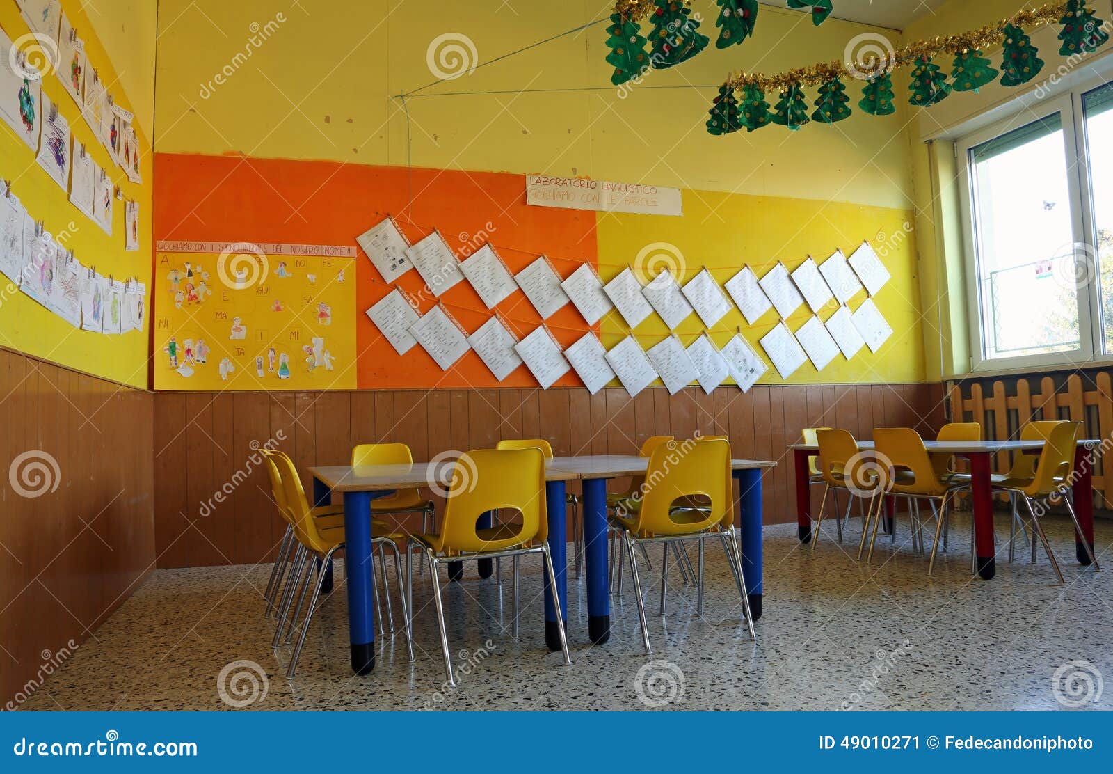 Interior Kindergarten Classroom with Chairs and Table Stock Image