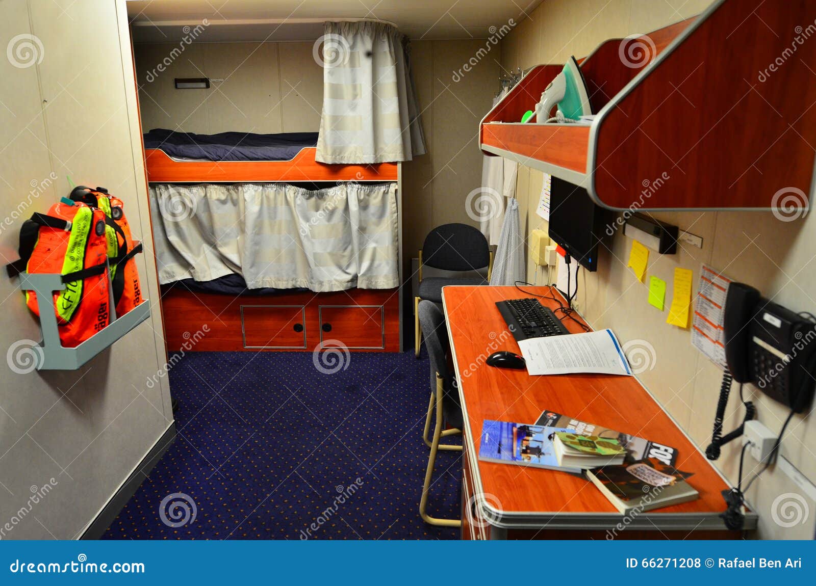 Interior Of A Living Cabin With Bunk Beds On Naval Ship