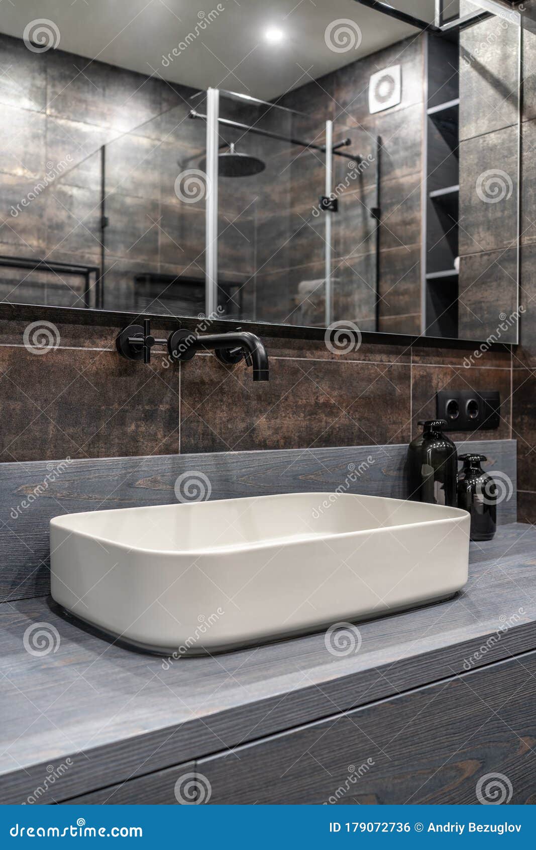 Interior Of Luminous Modern Bathroom With Bronze Walls Stock Photo