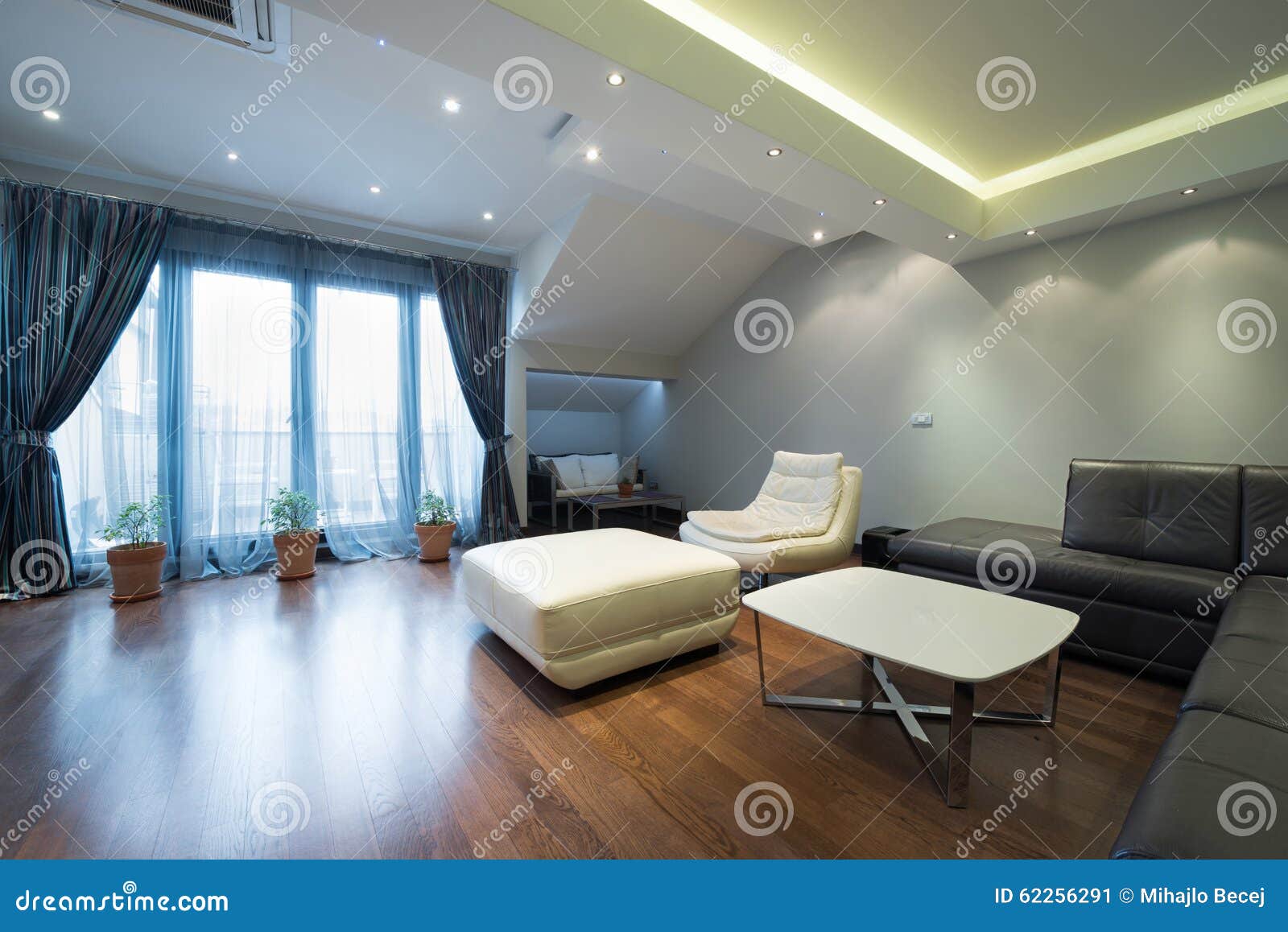 Interior Of A Luxury Living Room With Beautiful Ceiling Lights