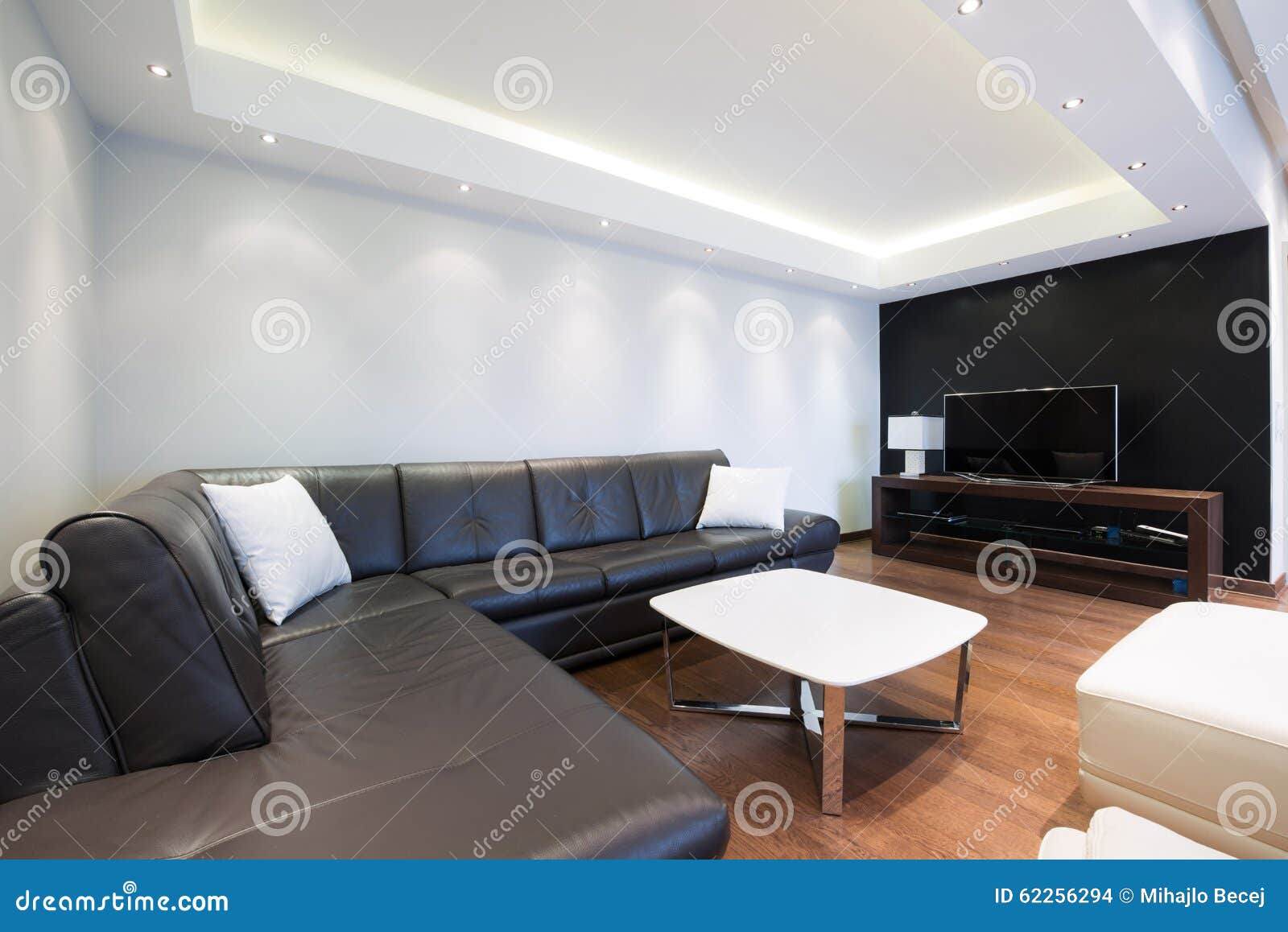 Interior of a Luxury Living Room with Beautiful Ceiling Lights Stock