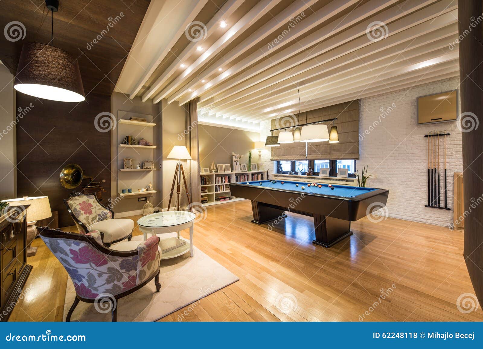 Interior of a Luxury Living Room with Billiard Table Stock Photo