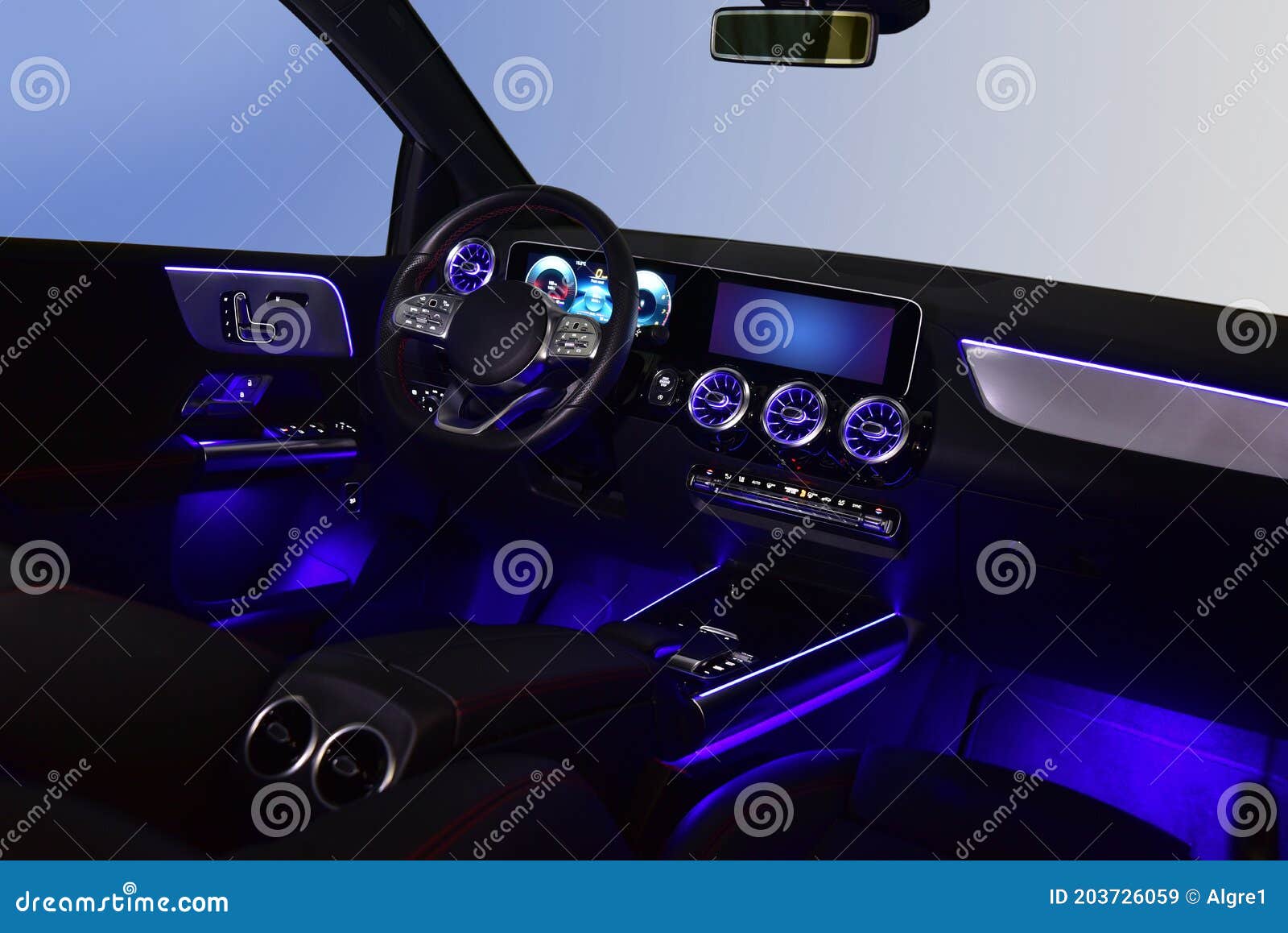Interior Luxury Passenger Car with Blue Light in Dark Stock Image
