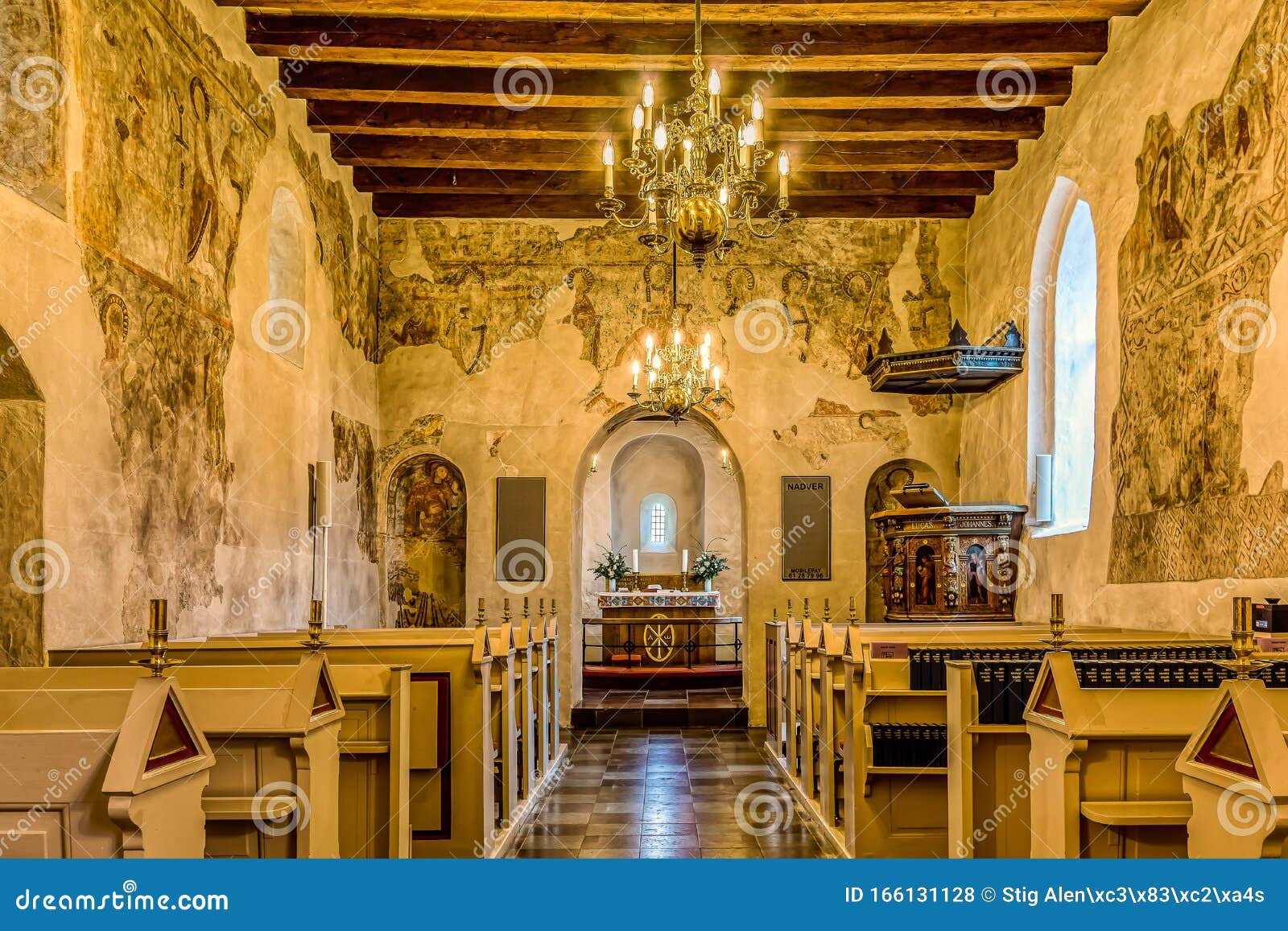 Interior of a Medieval Church with Flat Ceiling and Romanesque Murals