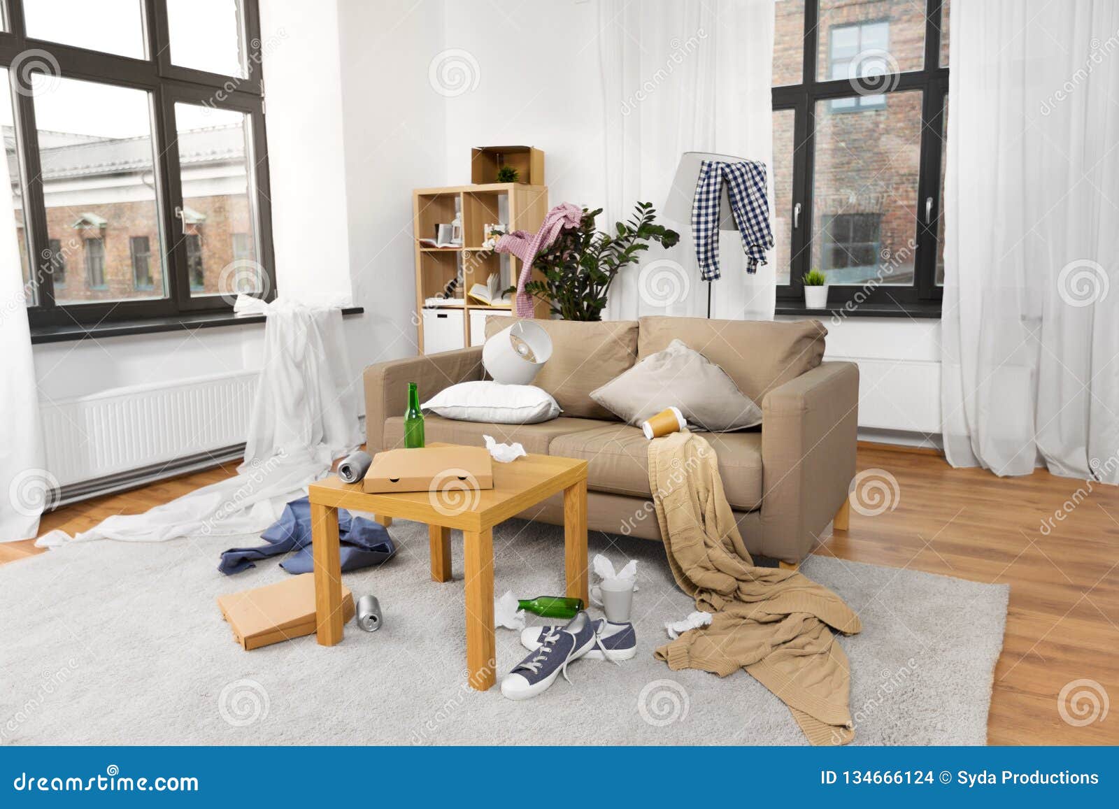 interior of messy home room with scattered stuff