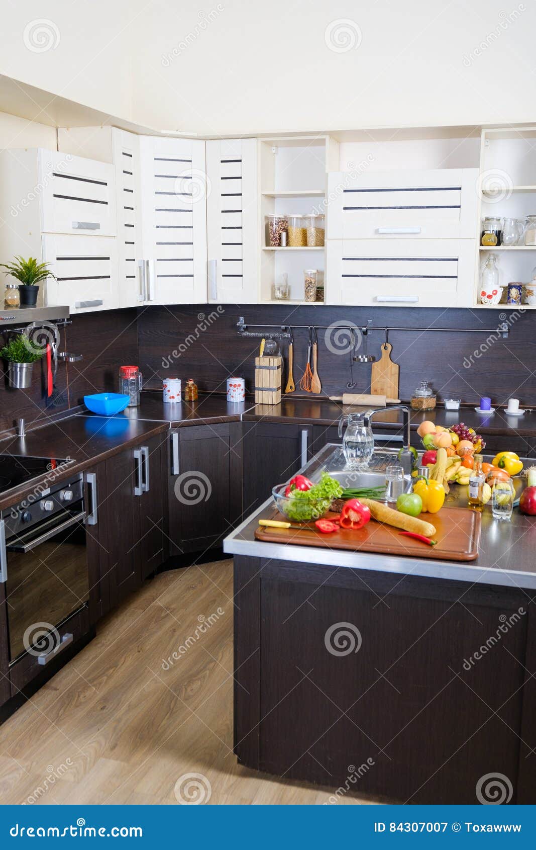 Interior of Modern Kitchen with Fruits and Vegetables Stock Image