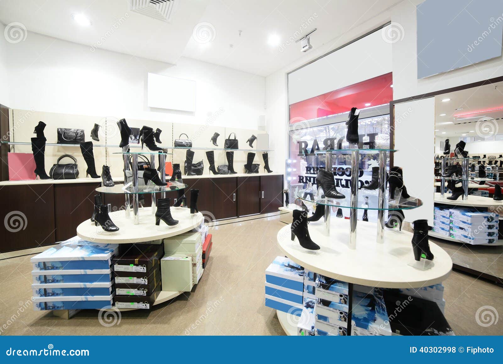Interior Of Shoe Store In Modern European Mall Stock Photo