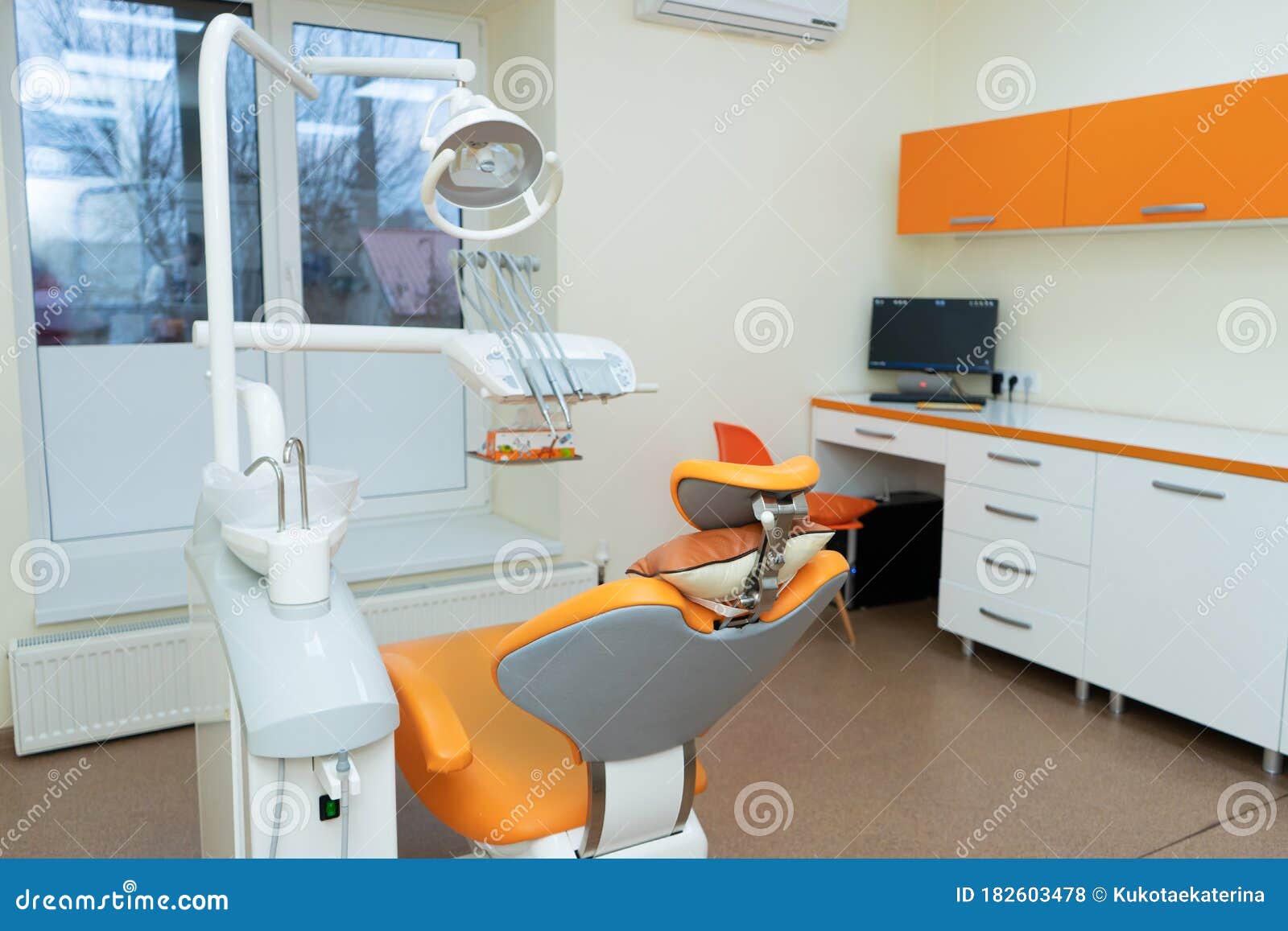 Interior Stylish Modern Dentist Office in Orange Style Stock Photo