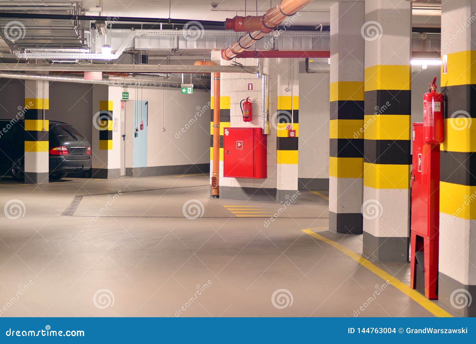 Underground Parking Garage of a Modern Apartment Building Stock Photo