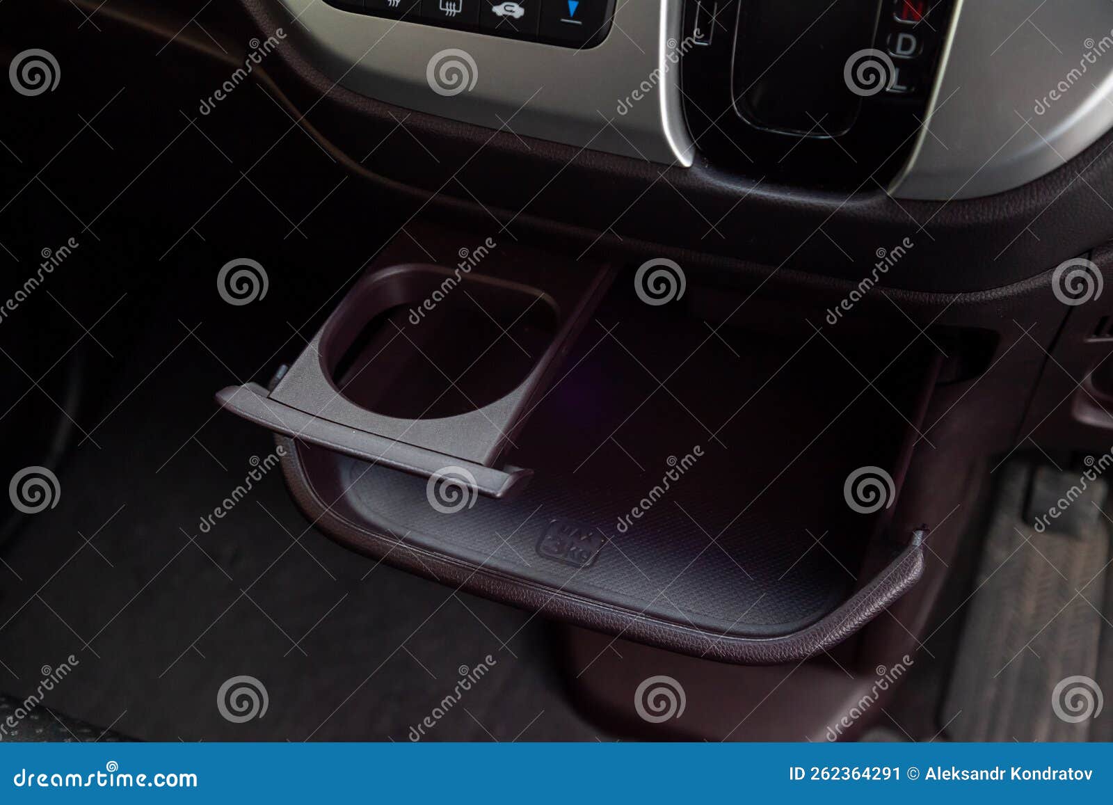 Interior View With Cupholder And Pocket On Front Panel On The Kei Car