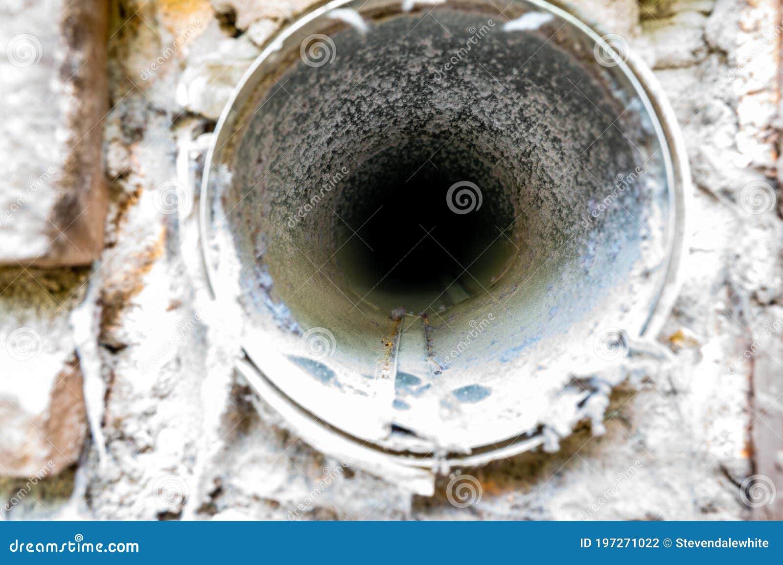 interior view of dryer vent line with lint and dust buildup