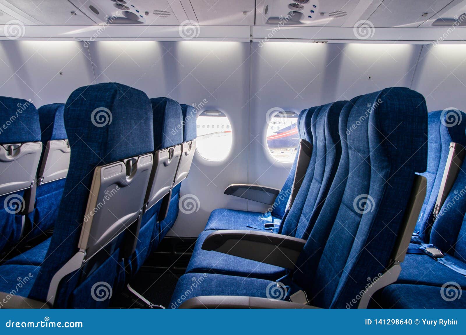 Interior View of Economy Coach Seats Inside of Passenger Airplane Editorial  Image - Image of international, economy: 141298640