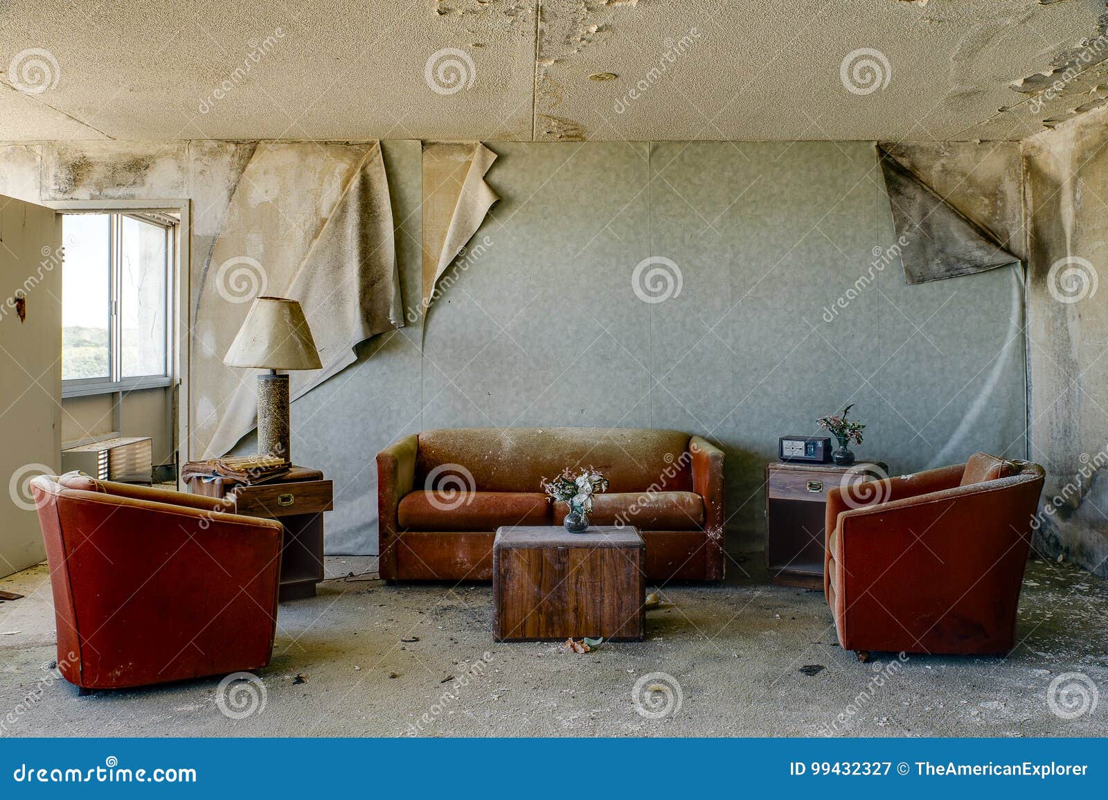 Intact Lodging Room With Burnt Orange Chairs Couch Abandoned