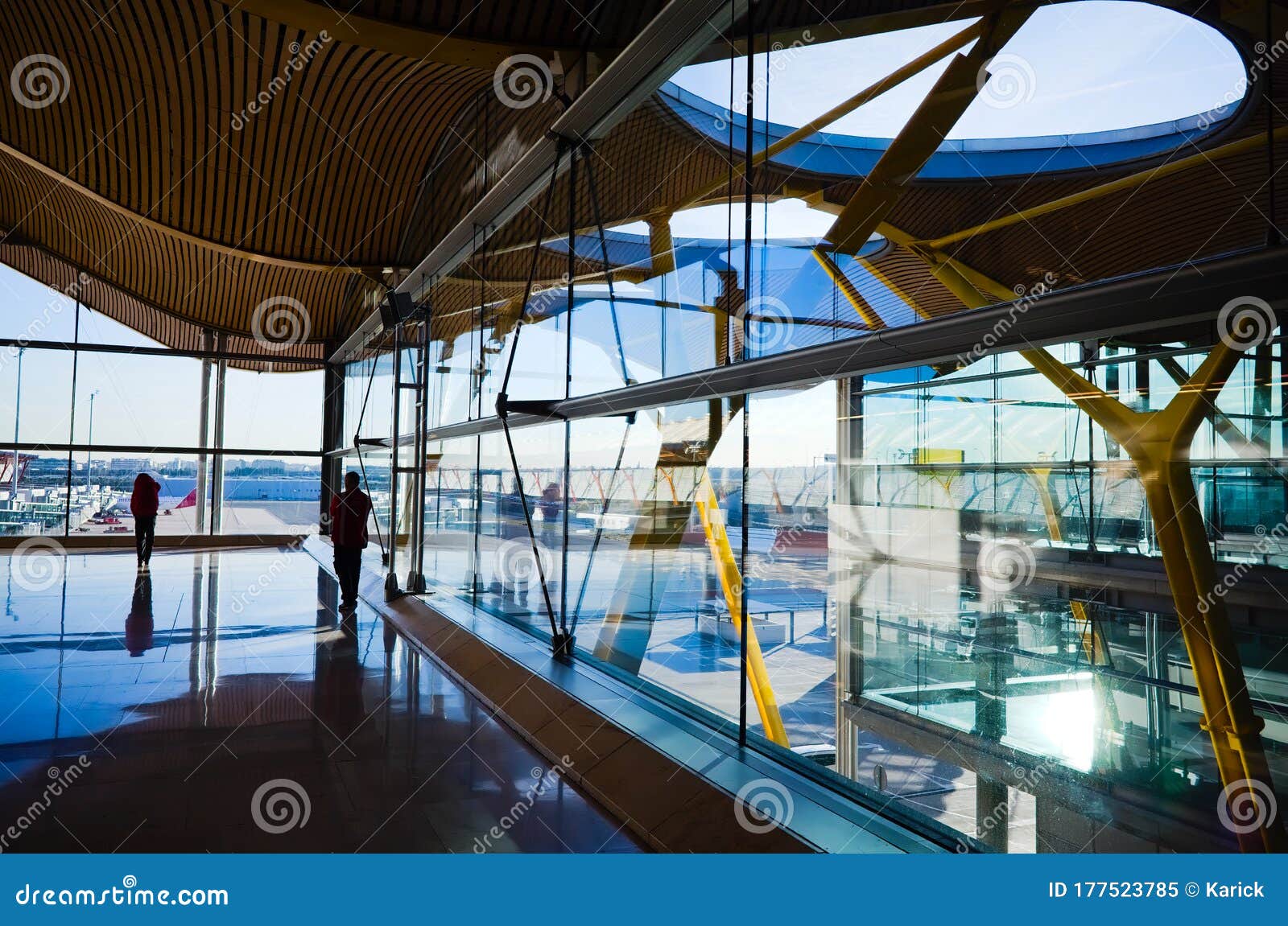interior view of the madrid barajas international airport with glass windows