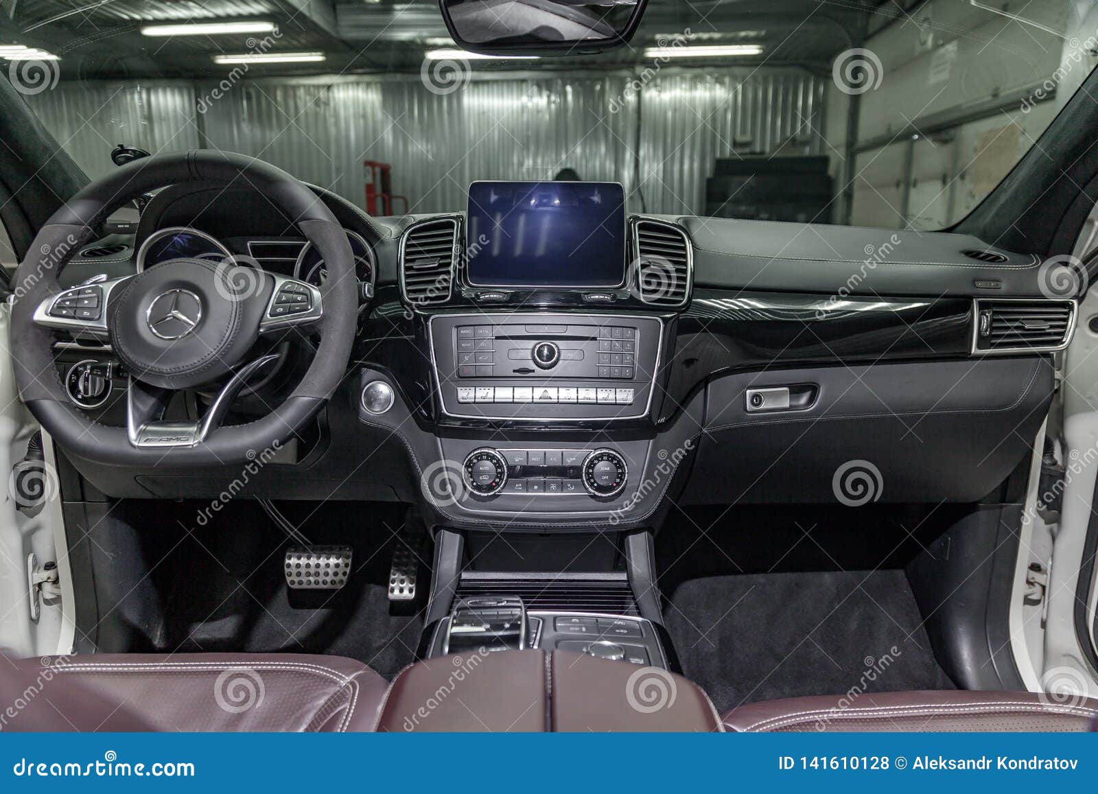 Interior View With Steeering Wheel And Dashboard Of Luxury Very Expensive New White Mercedes Benz Gle Coupe Amg 63s Car Stands In Editorial Stock Photo Image Of Design Crossover