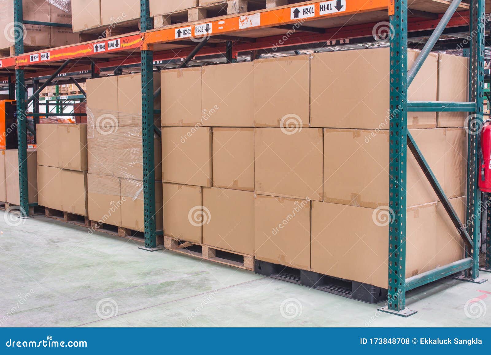 Interior of Warehouse. Rows of Shelves with Boxes Stock Photo Image