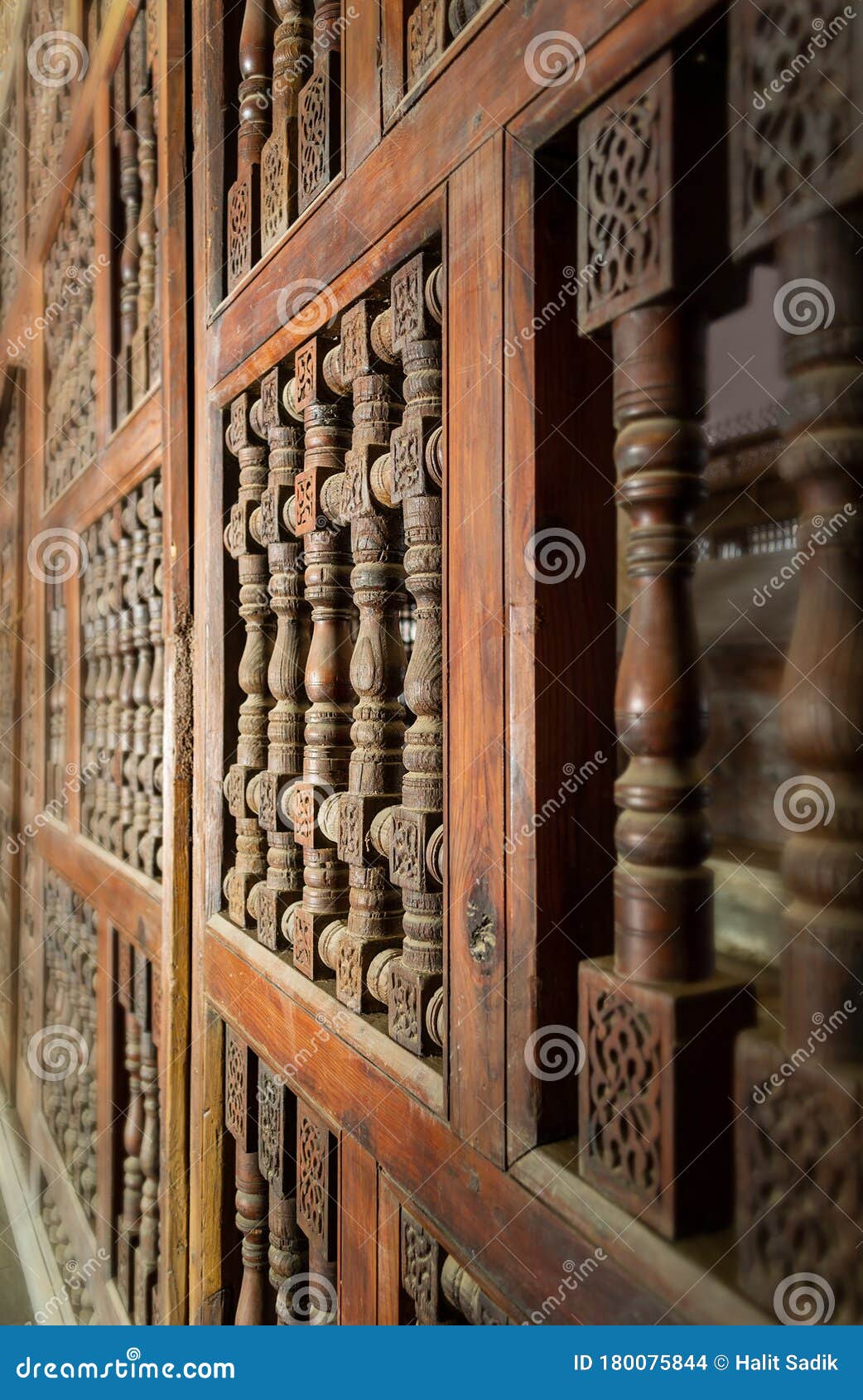 interleaved wooden ornate wall - mashrabiya -at abandoned building