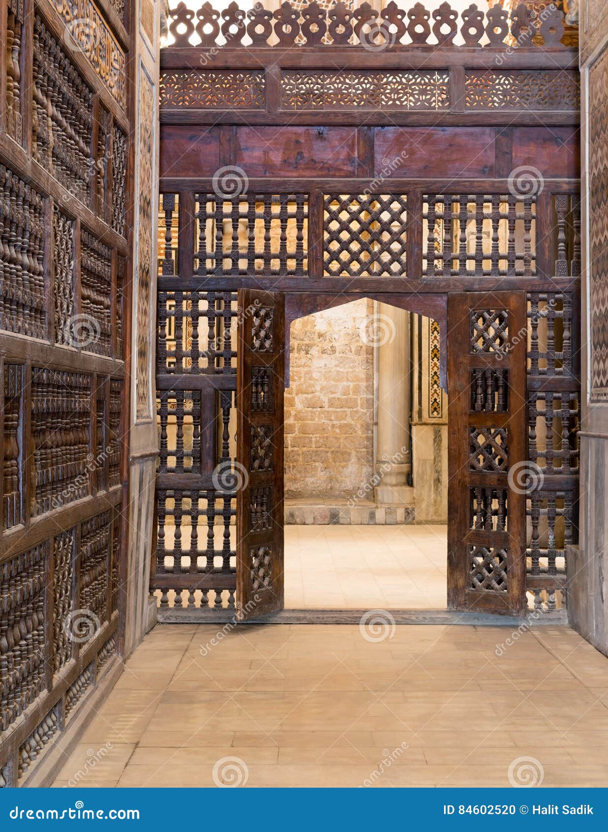 interleaved wooden wall mashrabiya with wooden ornate door