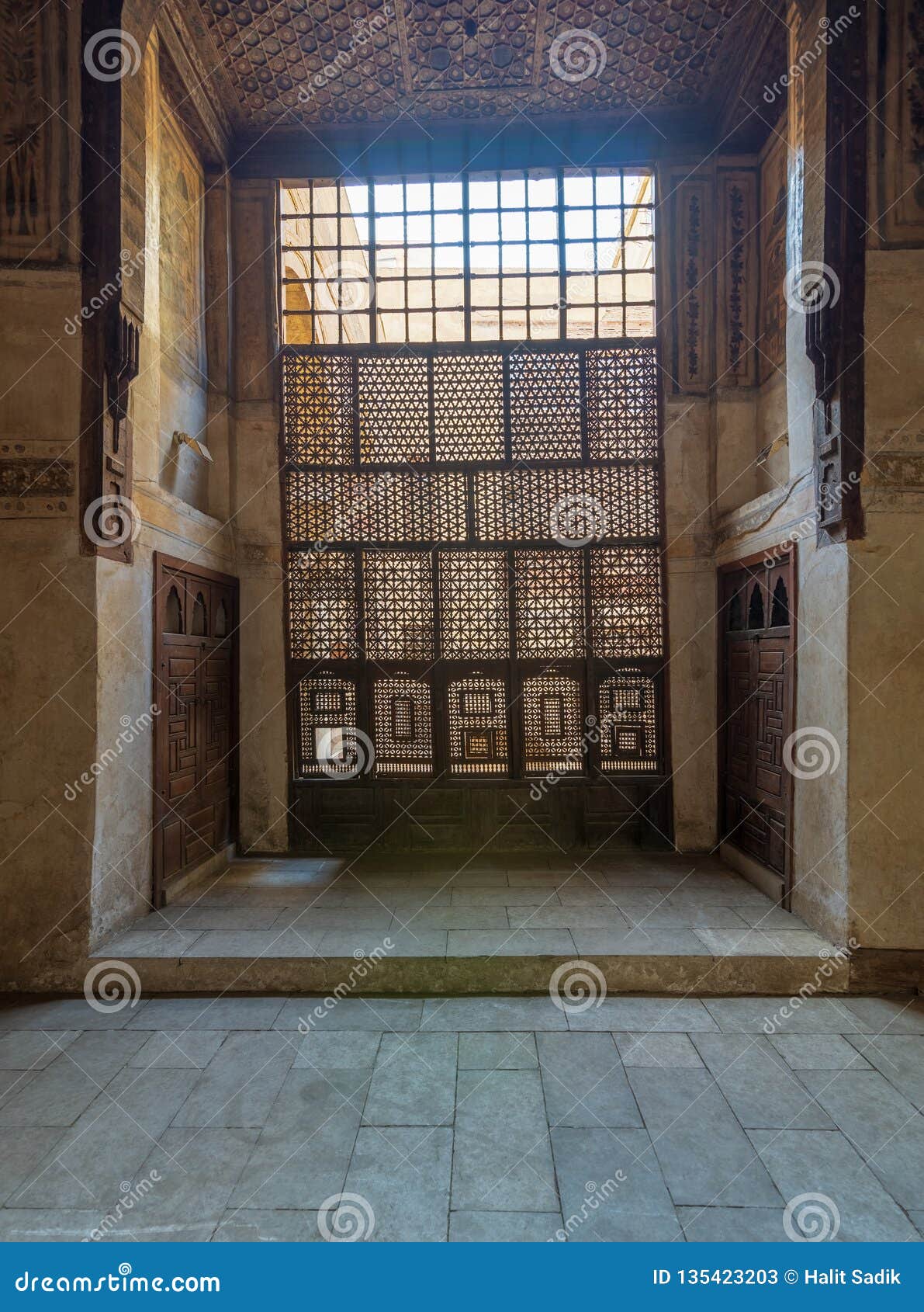 interleaved wooden window mashrabiya, and wooden decorated ceiling at ottoman historic waseela hanem house, old cairo, egypt