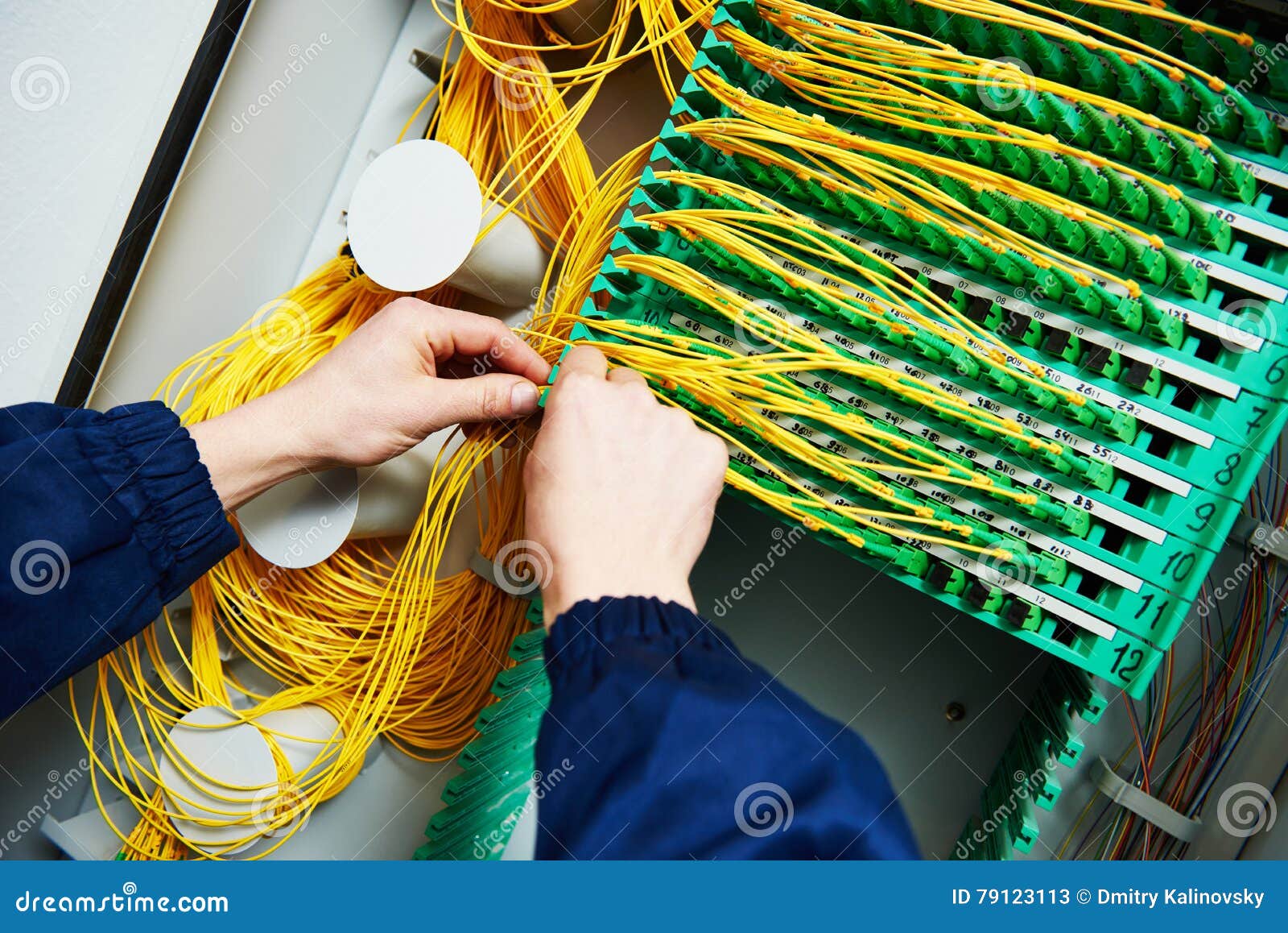 Connection. Engineer Connecting Fiber Optic Cables Stock Image