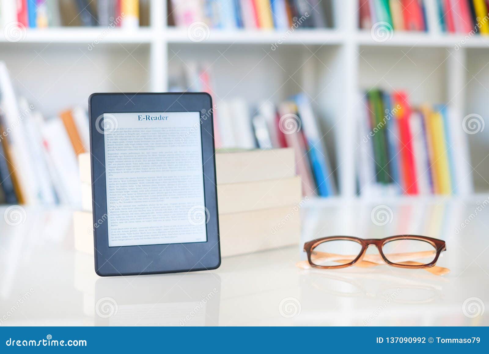 And Electronic Books Concept With Ebook Reader Stock Photo