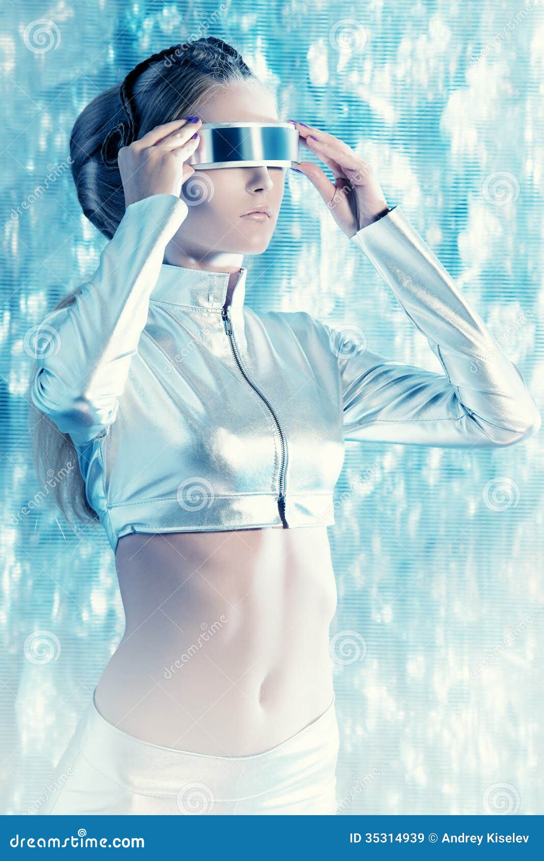 Beautiful Young Woman In Silver Latex Costume With Futuristic
