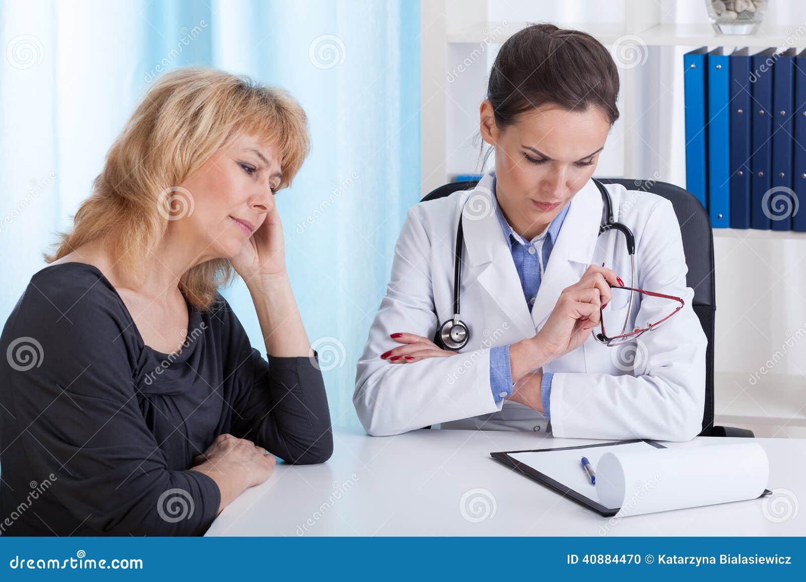 internist having bad news for a patient