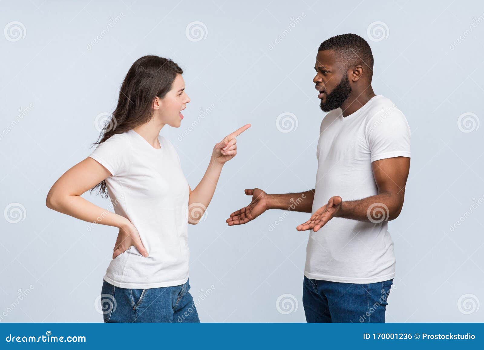 Interracial Couple Arguing, Angry Young Woman Blaming Her Afro ... image