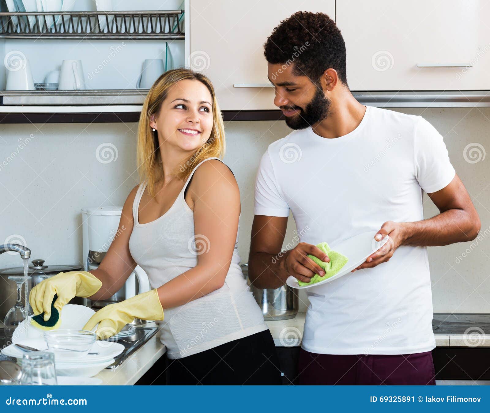 Interracial Couple Cleaning In The Kitchen Stock Image Image Of Clean Polish