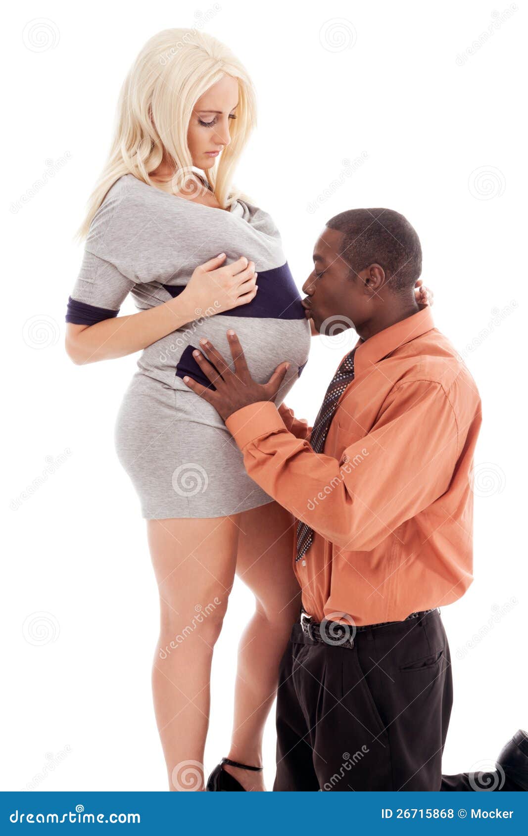 Interracial Family Pregnant Woman and Black Father Stock Photo image