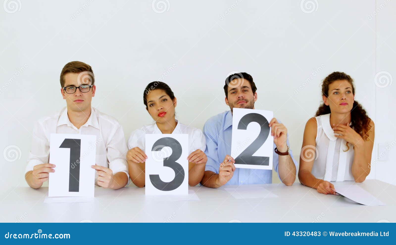 [Image: interview-panel-holding-up-low-scores-of...320483.jpg]