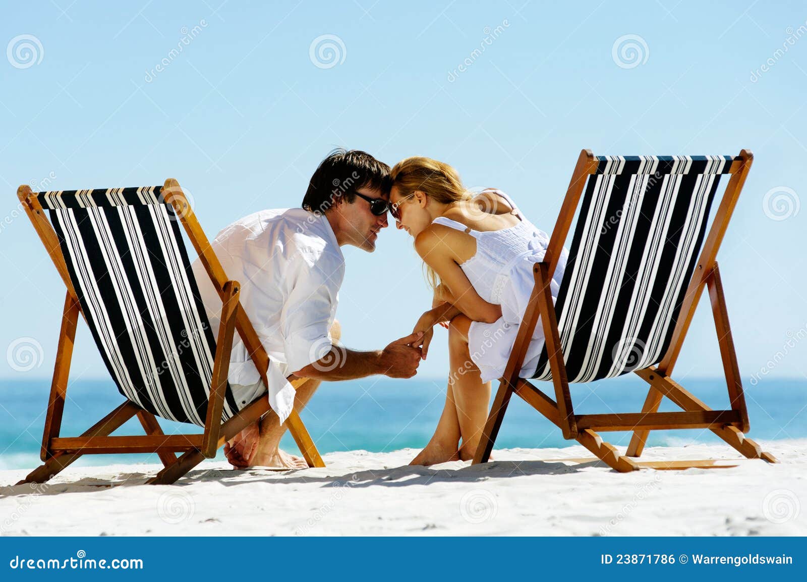 intimate beach couple