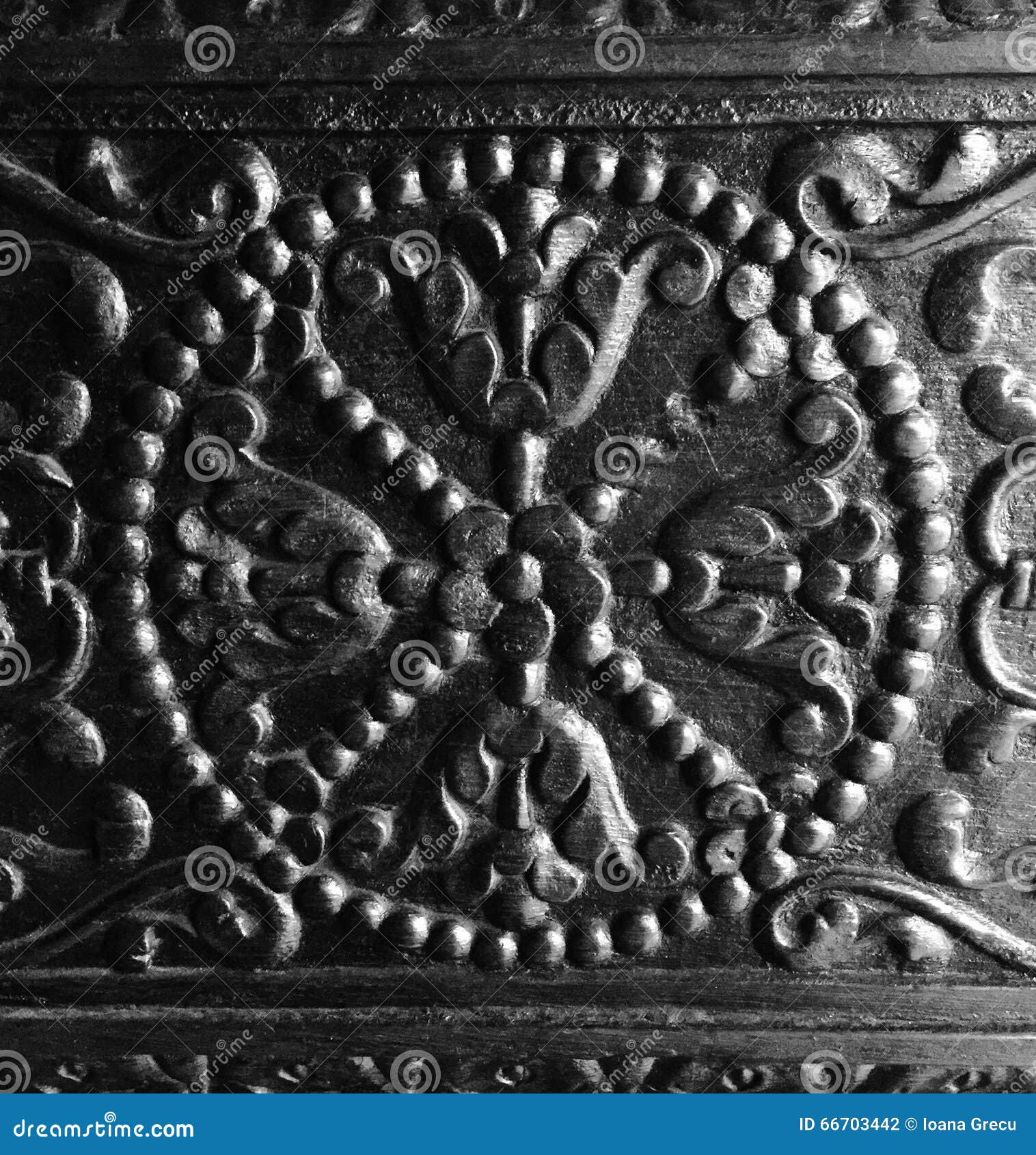 intricate craftsmanship on antique wood door