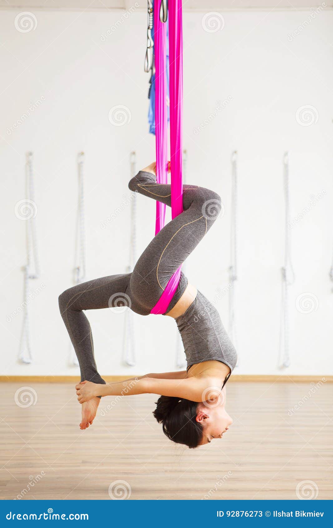 Aerial Yoga: How to Do It and Benefits You Can Gain