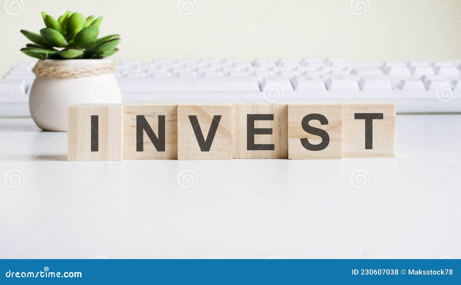 Invest Word Made with Building Blocks Isolated on White Stock Photo ...