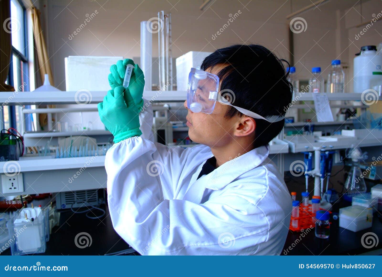 Investigator Checking Test Tubes. Stock Photo Image of discover