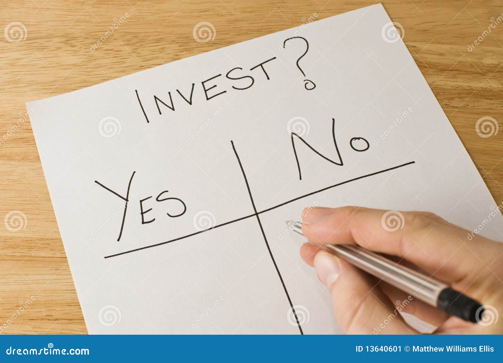 Investment decision stock image. Image of hand, investment 13640601
