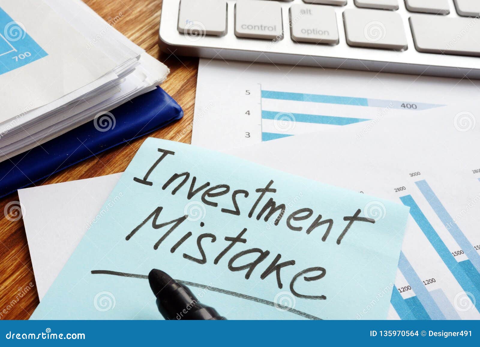 investment mistake written on financial documents