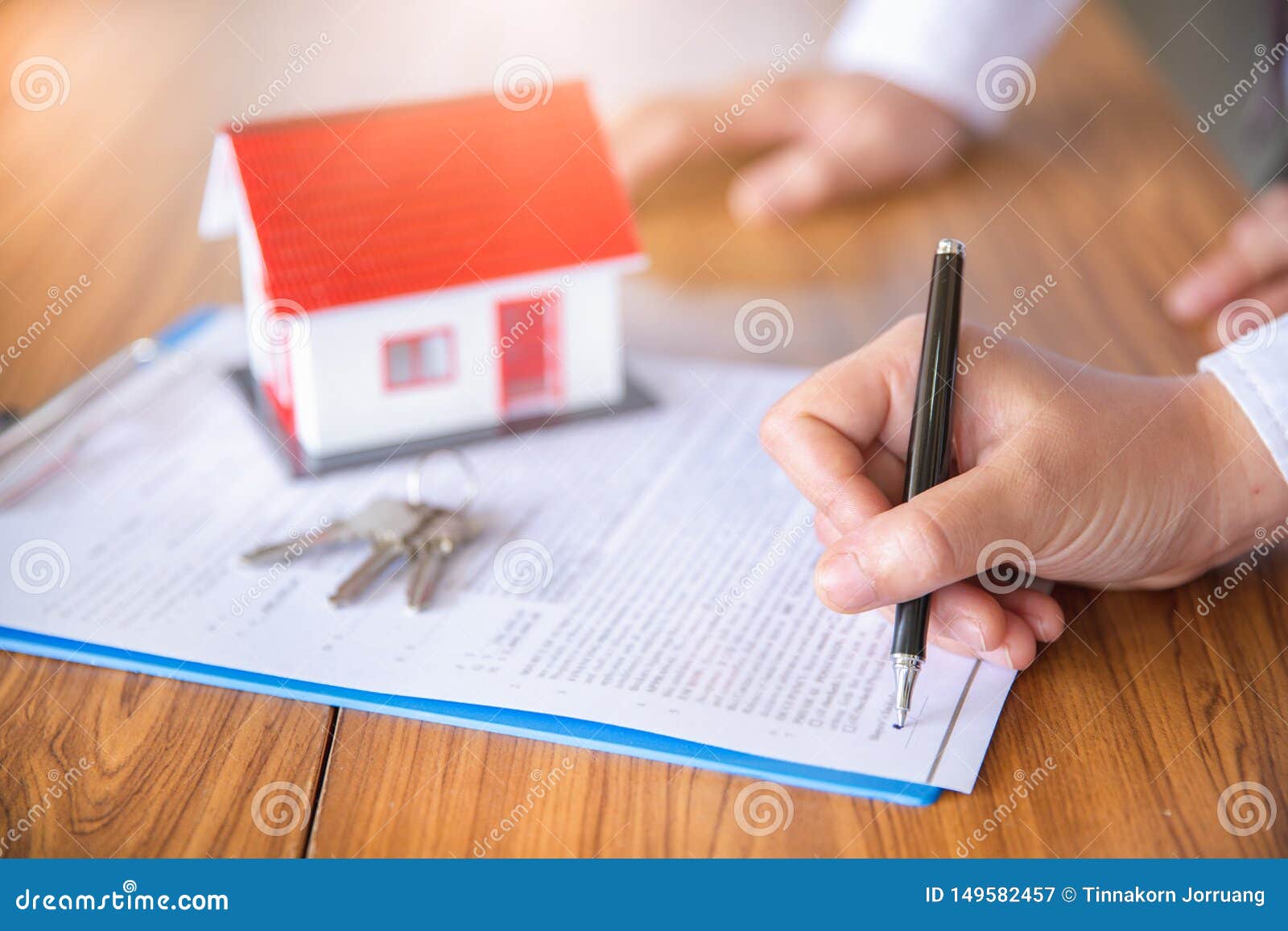 investors signed a contract,  buying and selling real estate. property investment and house mortgage financial concept