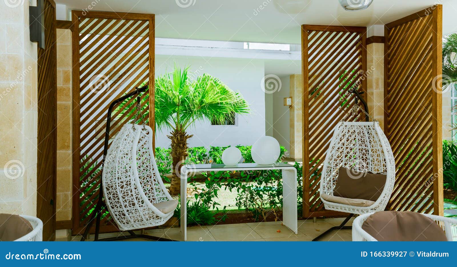 inviting view of cozy gorgeous comfortable outdoor spa resting area, nice relaxing atmosphere