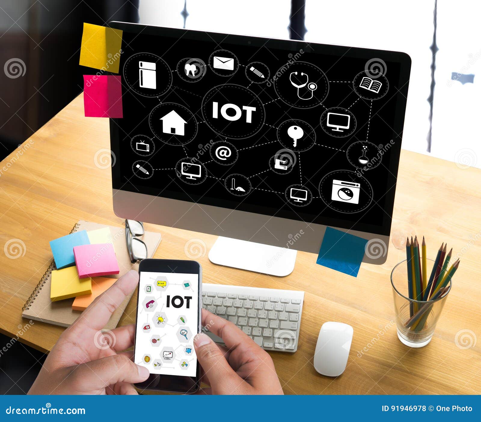 iot business man hand working and internet of things (iot) word