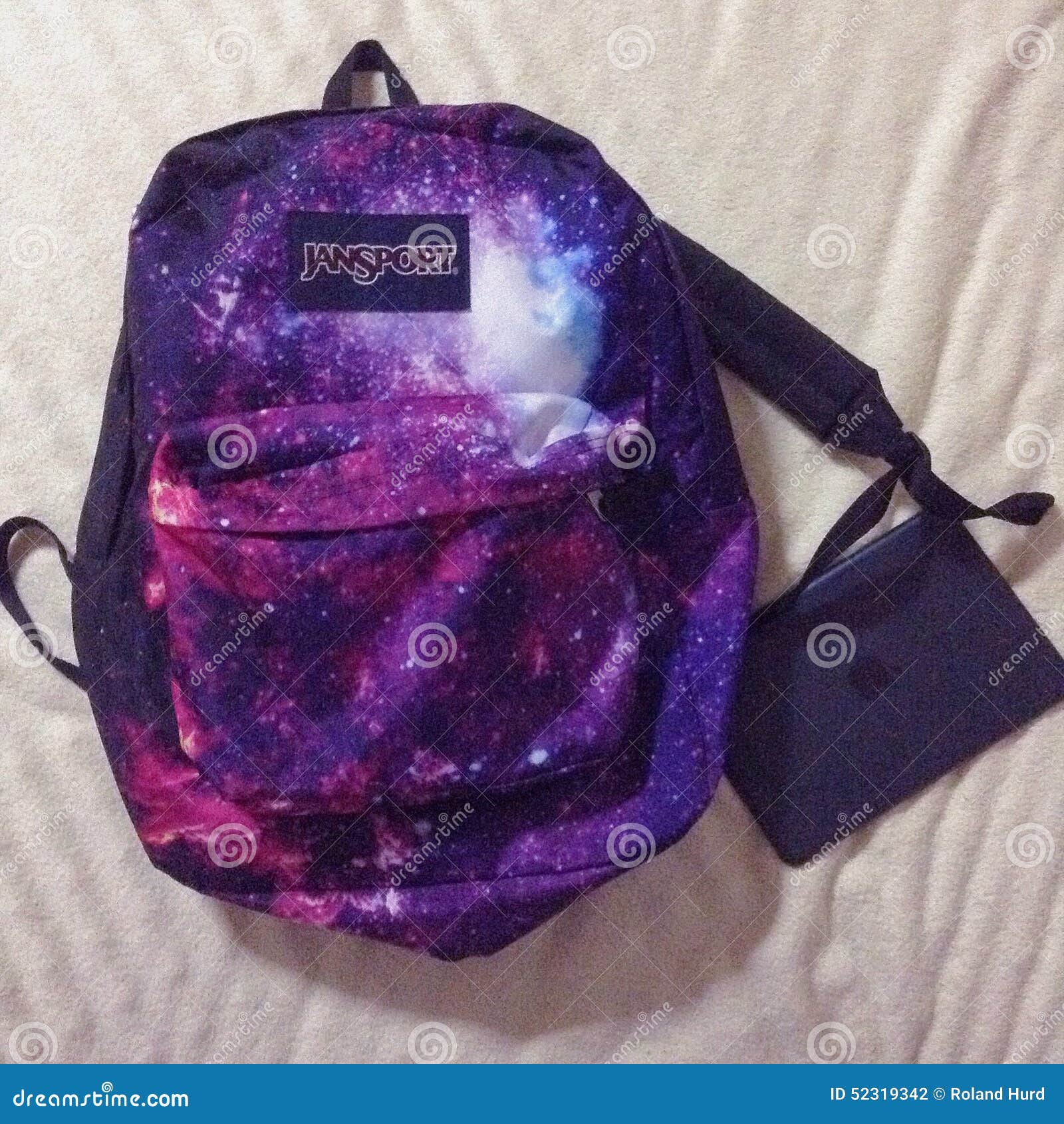 Ipad and backpack editorial photography. Image of mini 52319342