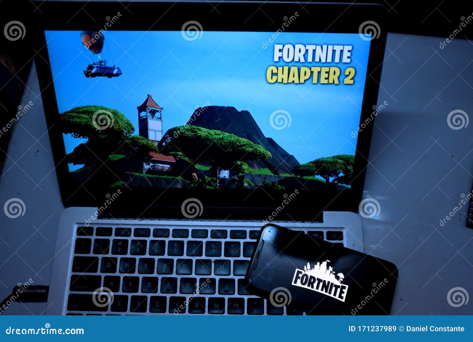 Iphone 11 Pro And Macbook With The Fortnite 2 Logo Fortnite Editorial Stock Image Image Of Hobby Digital 171237989