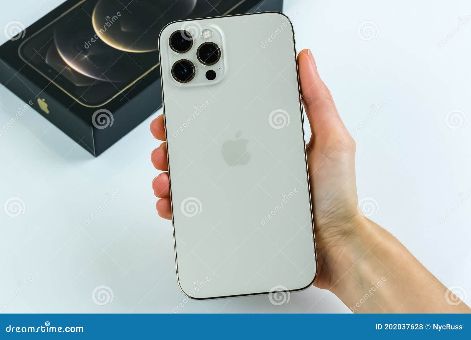 Iphone 12 Pro Max Gold In Customers Hand Editorial Stock Photo Image Of Midnight Phone