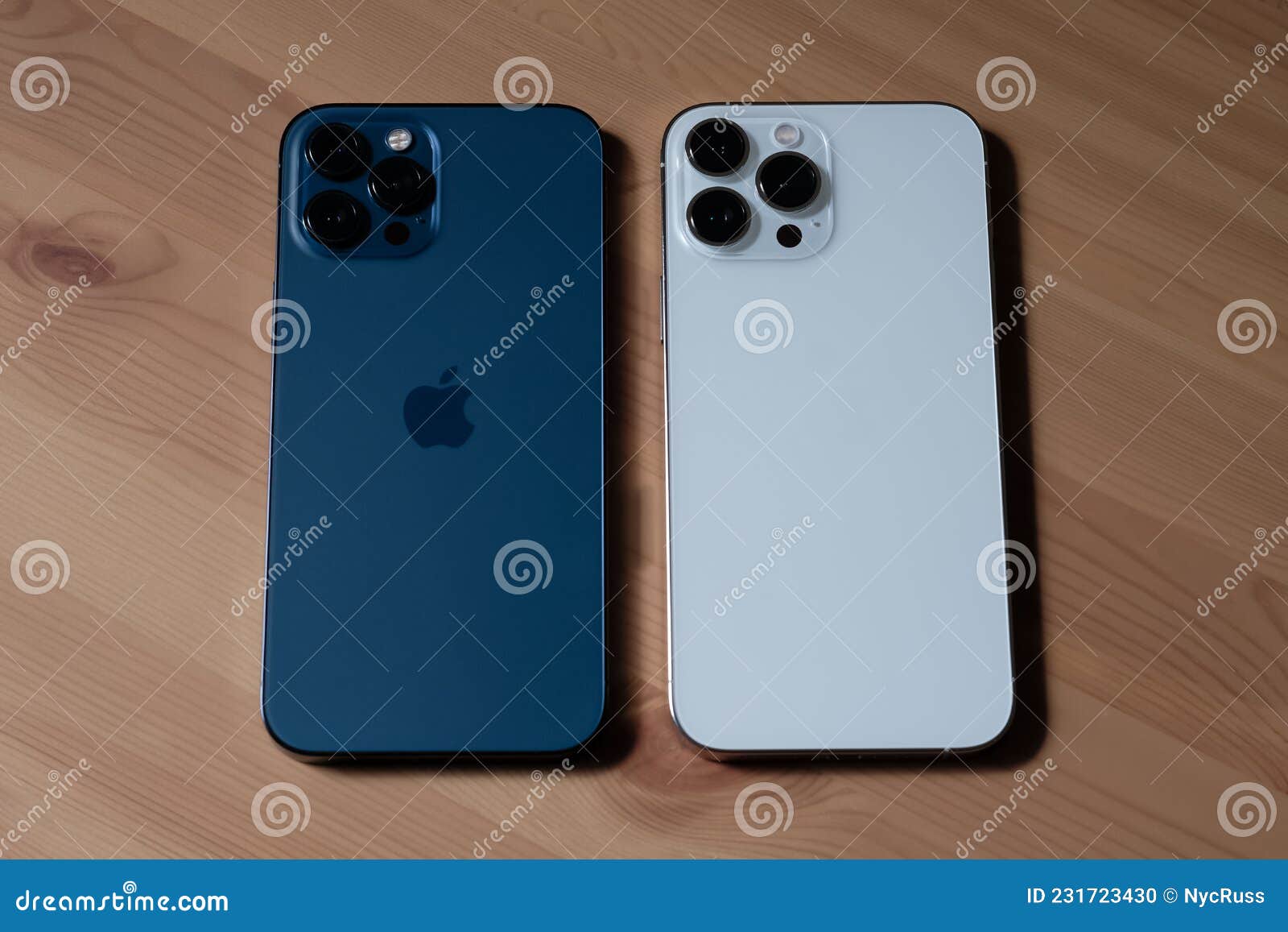 IPhone 13 Pro Max in Silver and IPhone 12 Pro Max in Pacific Blue