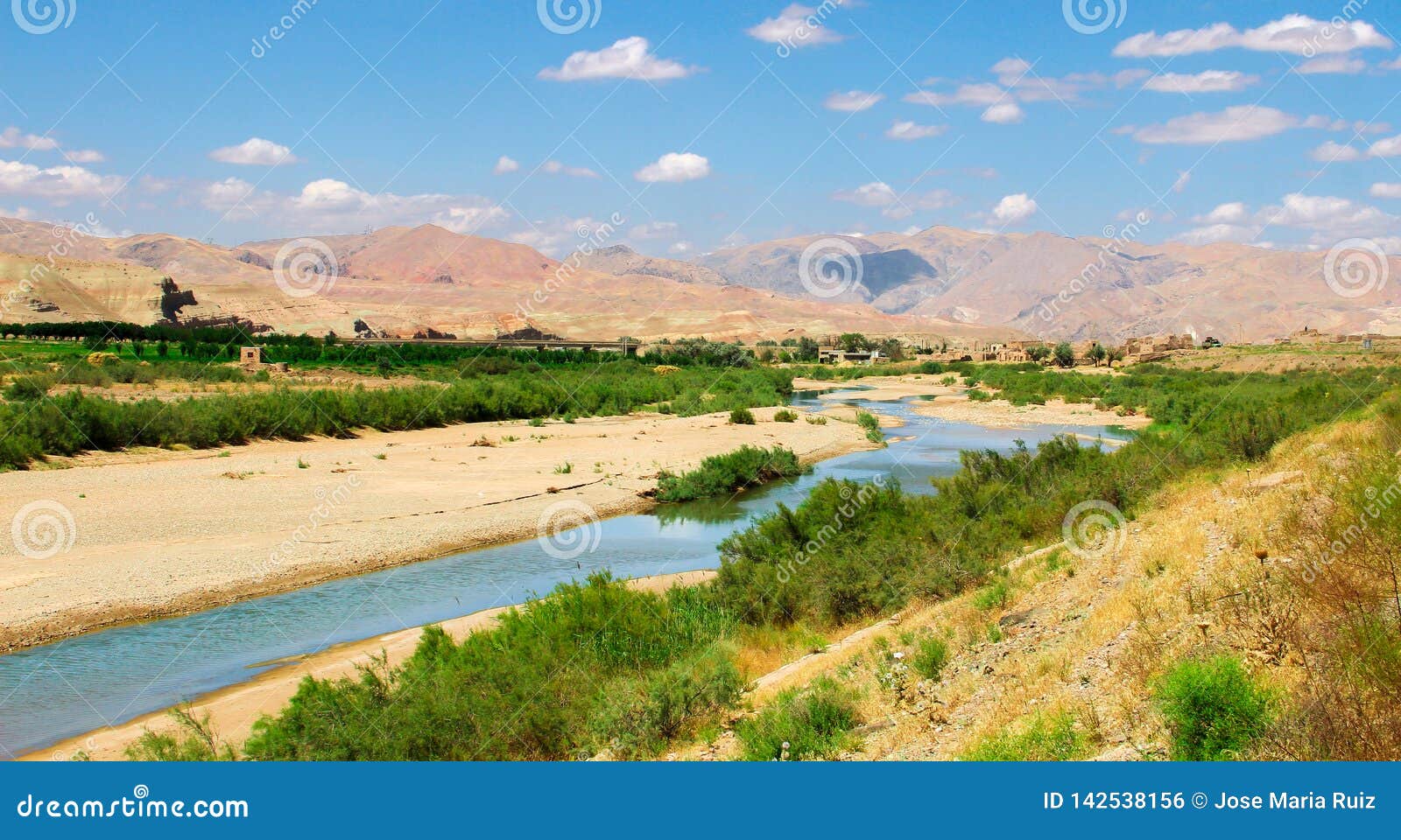River In The Middle Of The Desert Of Iran With Mountains And Grass And The Horizont With Cloudy Sky Stock Photo Image Of Wild Exploration