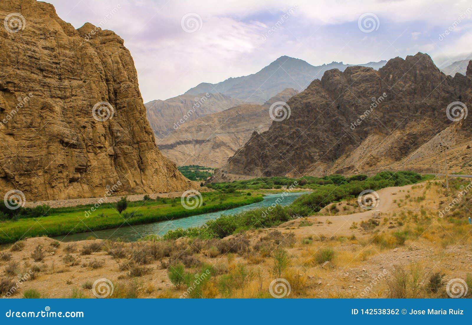 valley in north iran near the border with armenia and azerbaiyan, desert with a river and grass