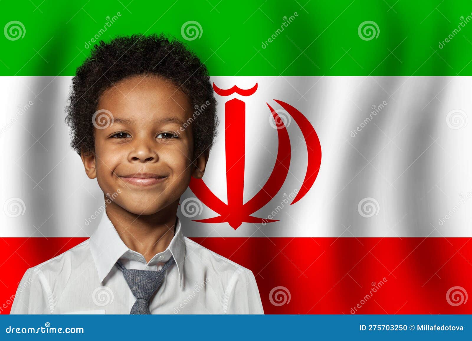 irani kid boy on flag of iran background. education and childhood concept